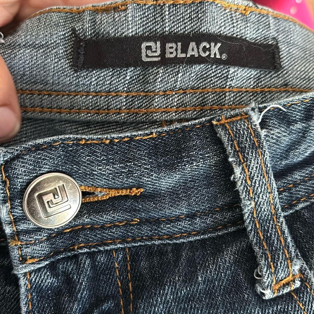 Black jeans 30X30 I won’t charge extra for the holes very nice jeans